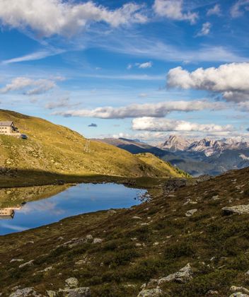 Lake Radlsee on the Feldthurns mountain pasture