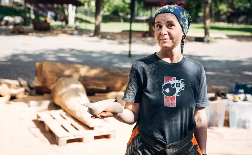 A female wood carver