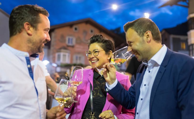Three people at the white wine festival