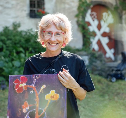 A woman with a painting