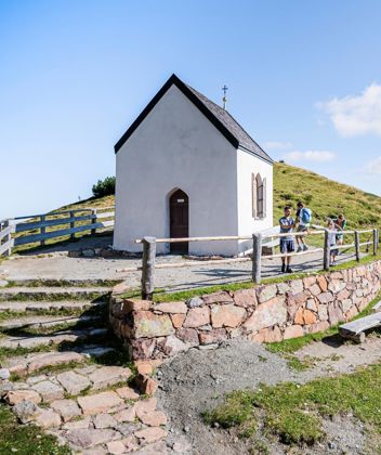 A family at the Totenkirchl church