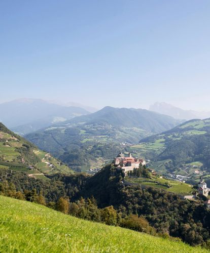 View on the Säben Monastery and the mountains in summer