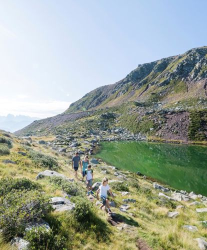 A family at the Totensee Lake